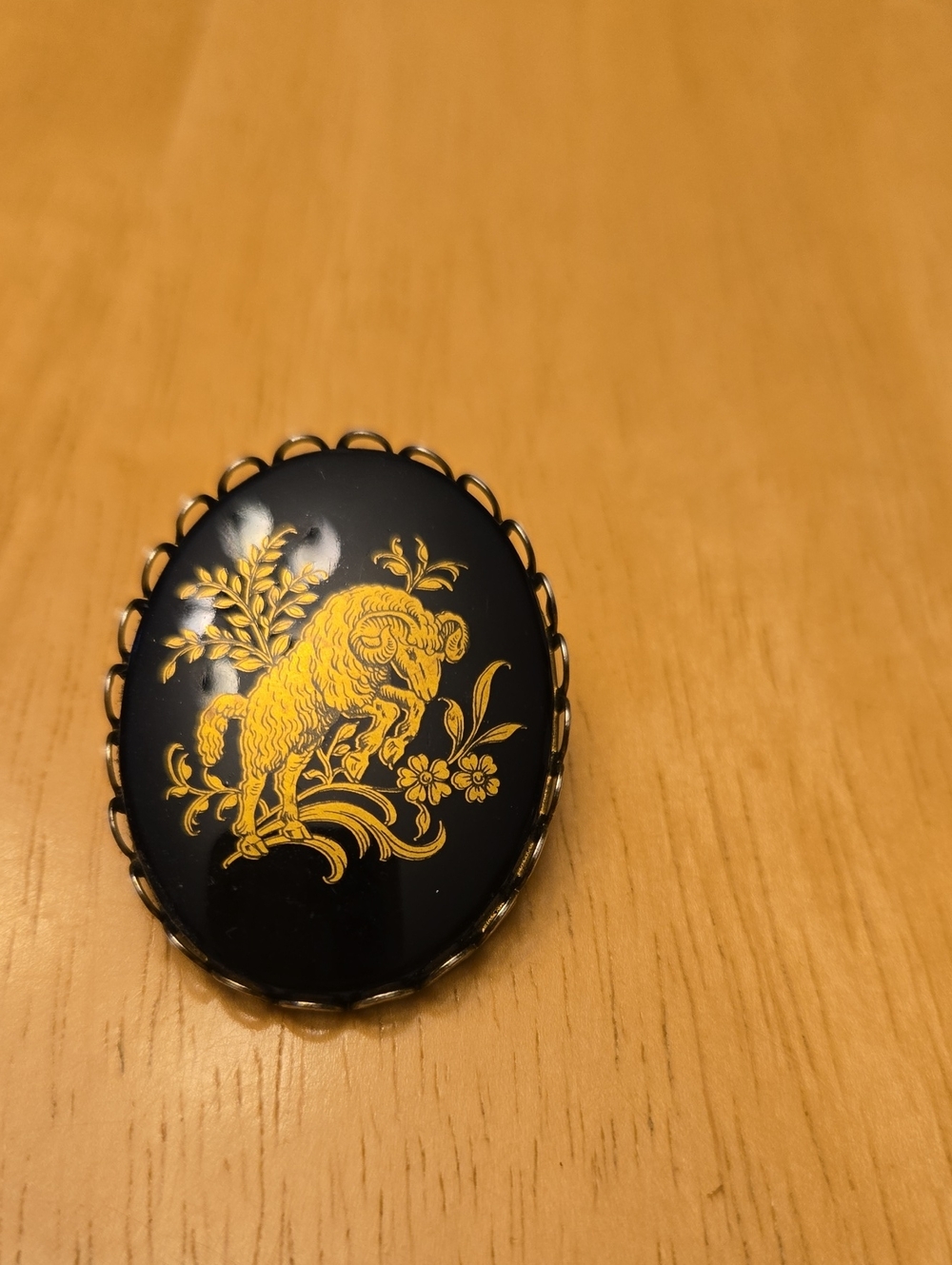 Black and Gold Ram Motif Oval Brooch